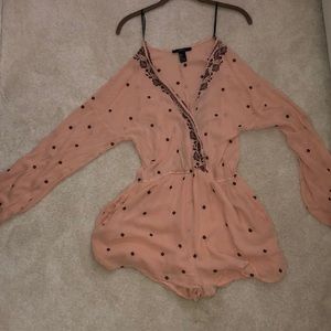 A beautiful light pink romper with maroon roses!